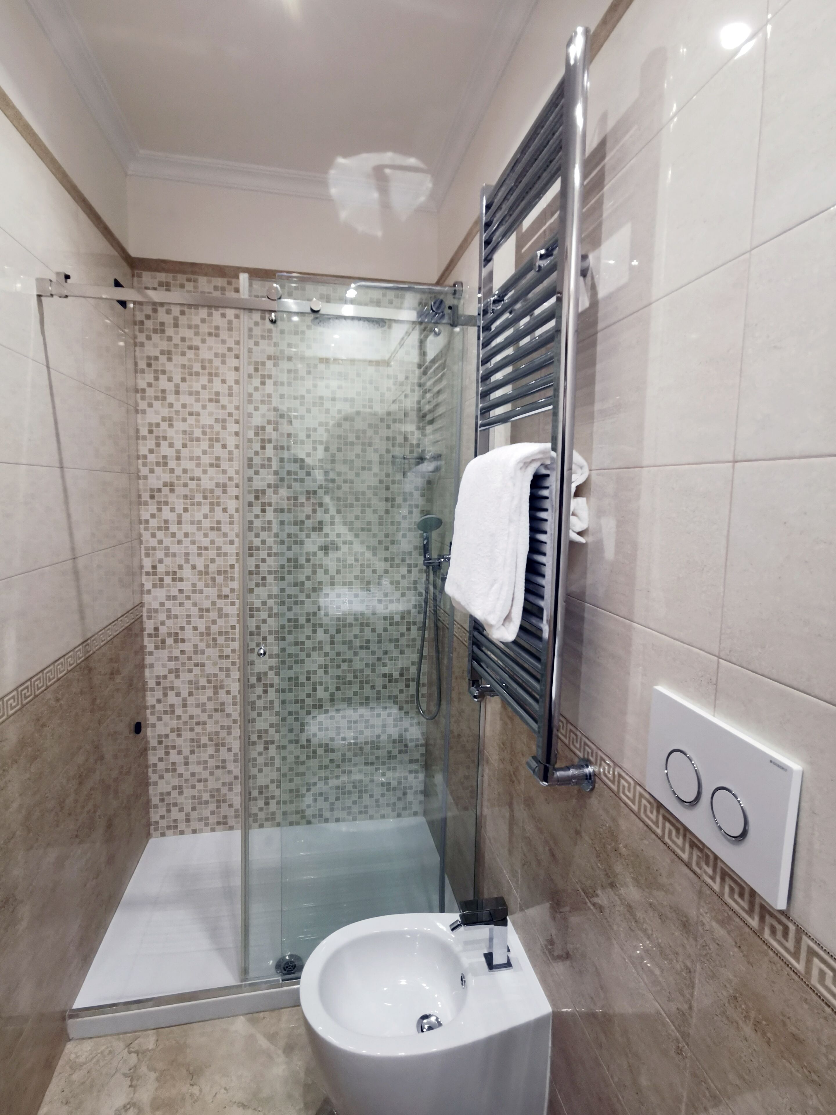 superior double or twin room | bathroom | rainfall showerhead, hair dryer, bidet, towels