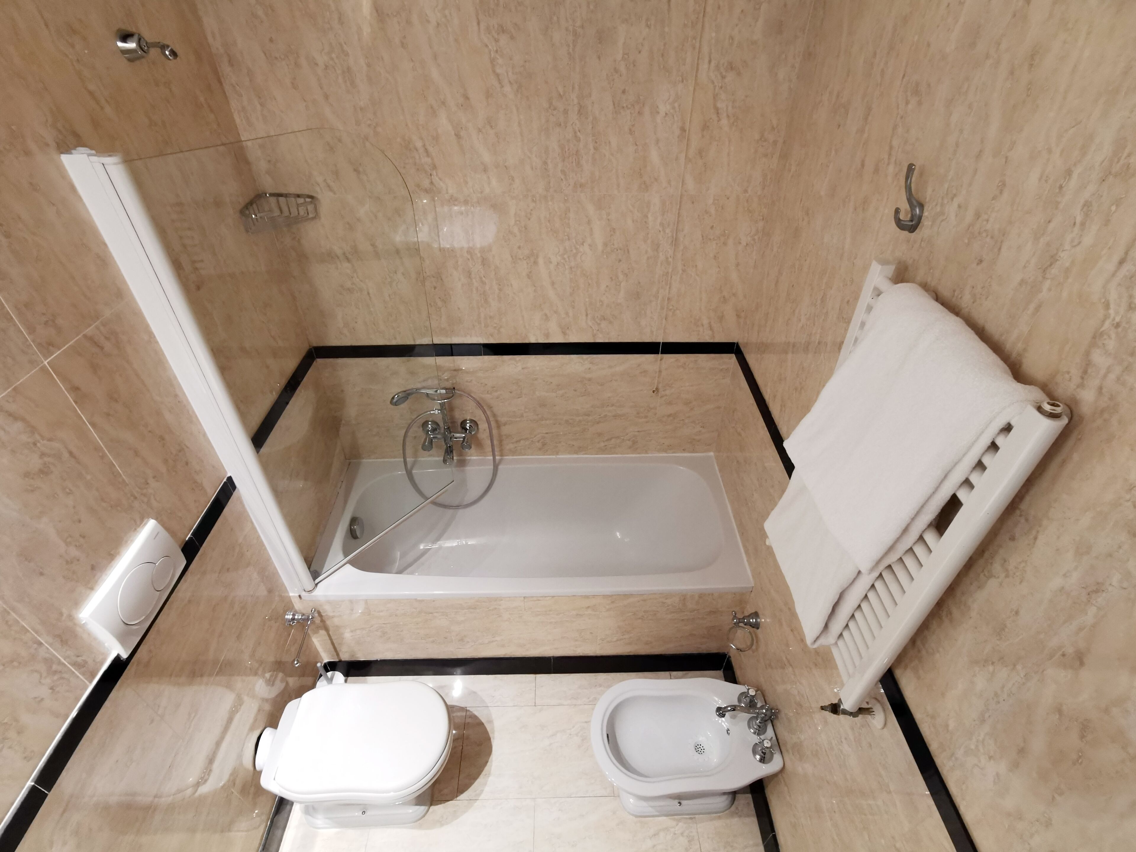 double or twin room | bathroom | rainfall showerhead, hair dryer, bidet, towels