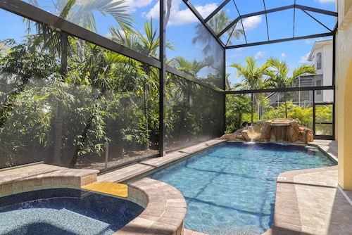 150 yards to the beach. Waterfall resort style pool, private theater and more
