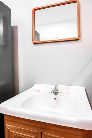 Standard Shared Dormitory | Bathroom | Shower, bidet, towels, soap