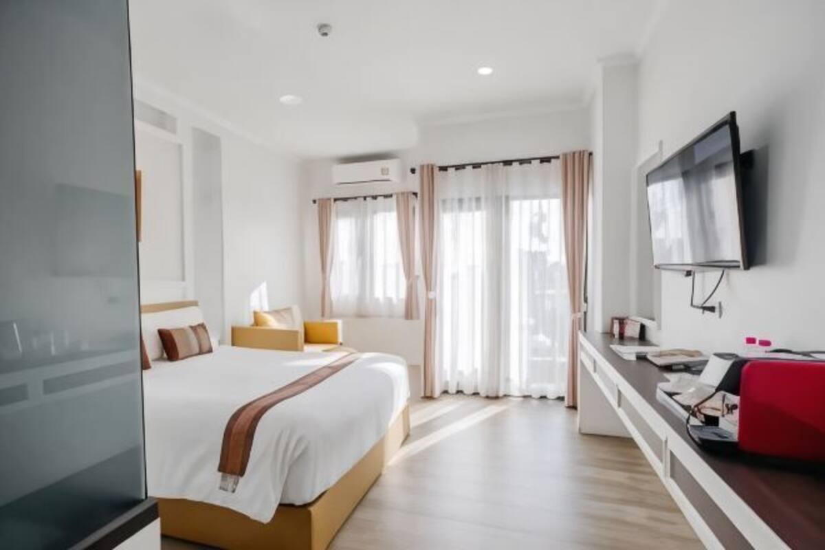 Roba de llit hipoal·lergògena i caixa forta a l'habitació 