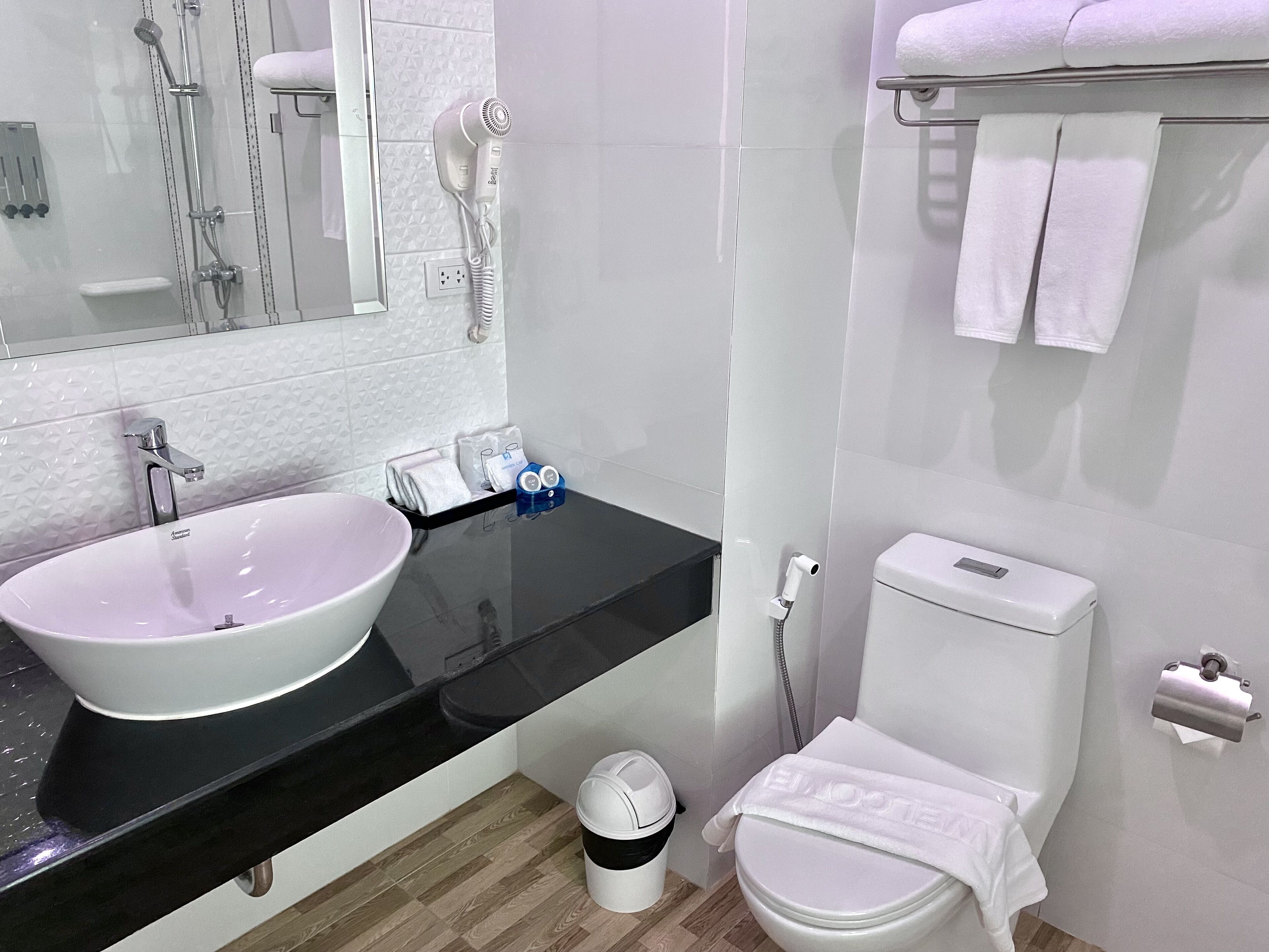 deluxe double room | bathroom amenities | free toiletries, hair dryer, bathrobes, slippers