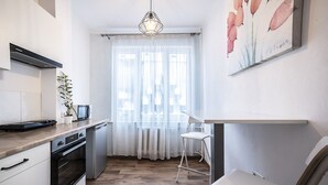 Superior-huoneisto | Työpöytä, silitysrauta/-lauta, ilmainen Wi-Fi, vuodevaatteet