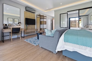 Superior Double or Twin Room | Living area | 50-inch flat-screen TV with satellite channels, TV