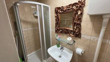 City Apartment, 1 Bedroom | Bathroom | Shower, hair dryer, slippers, towels