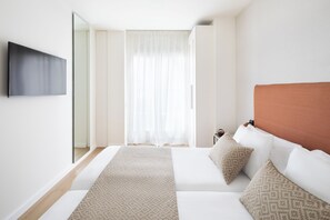 Caja fuerte, sistema de insonorización, wifi gratis y ropa de cama