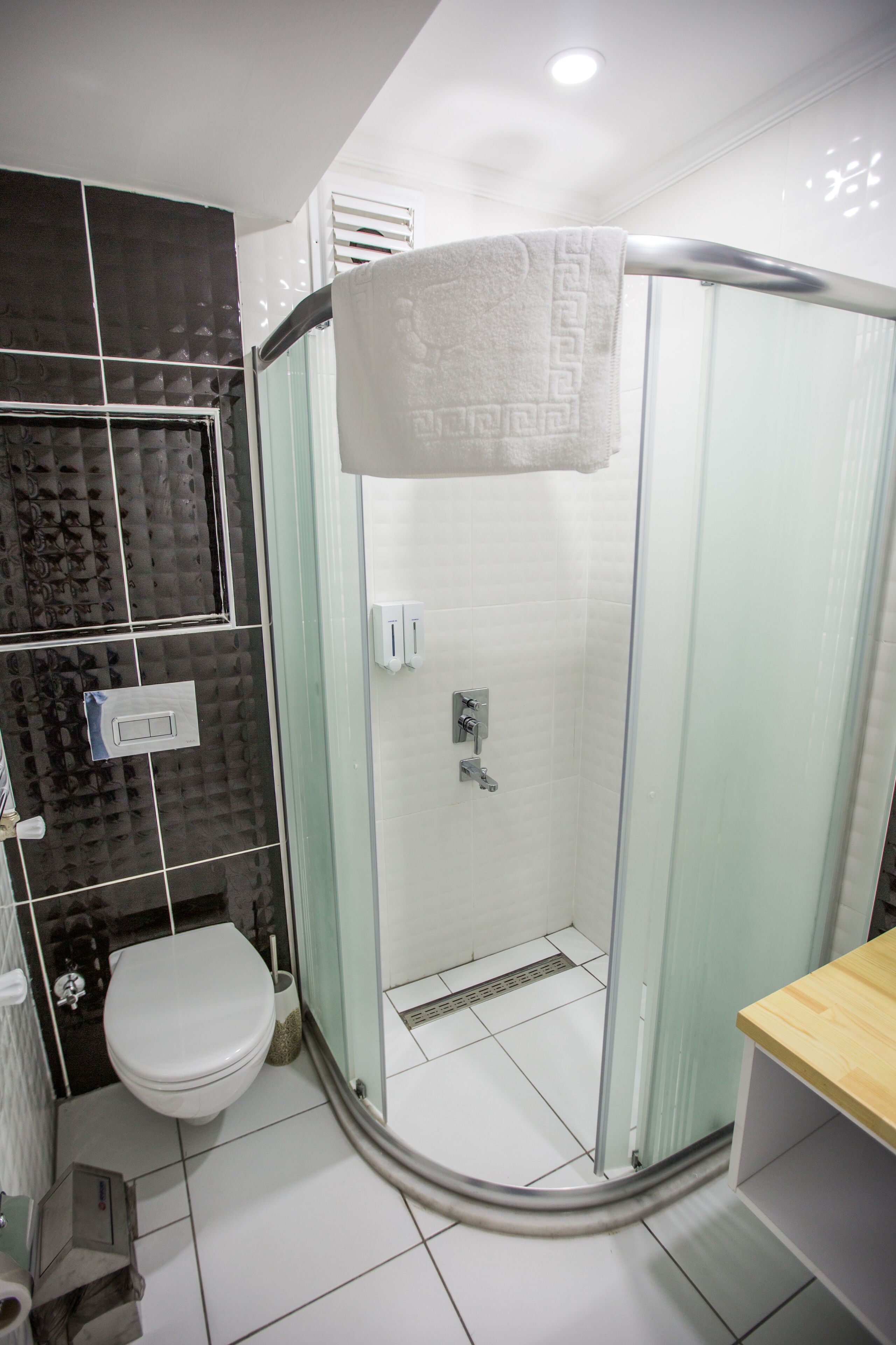 shower, free toiletries, hair dryer, slippers