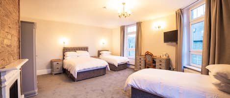 Chambres insonorisées, fer et planche à repasser, draps fournis