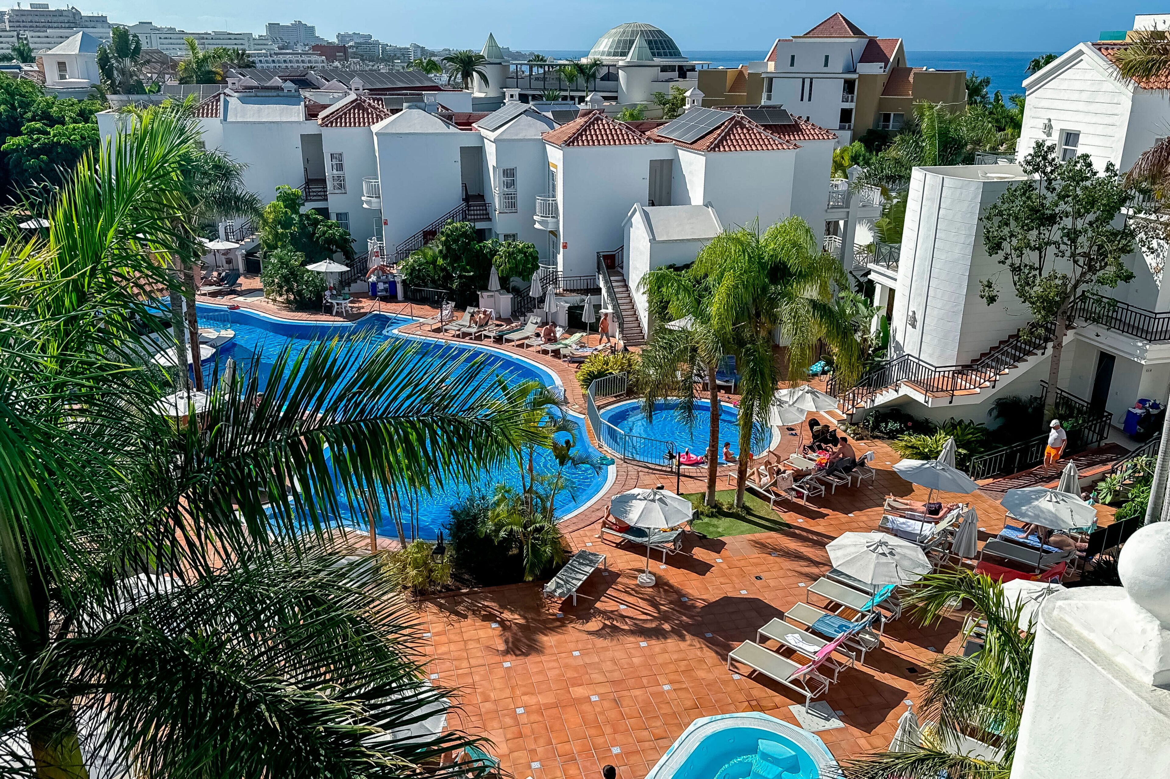 outdoor pool, pool umbrellas, pool loungers