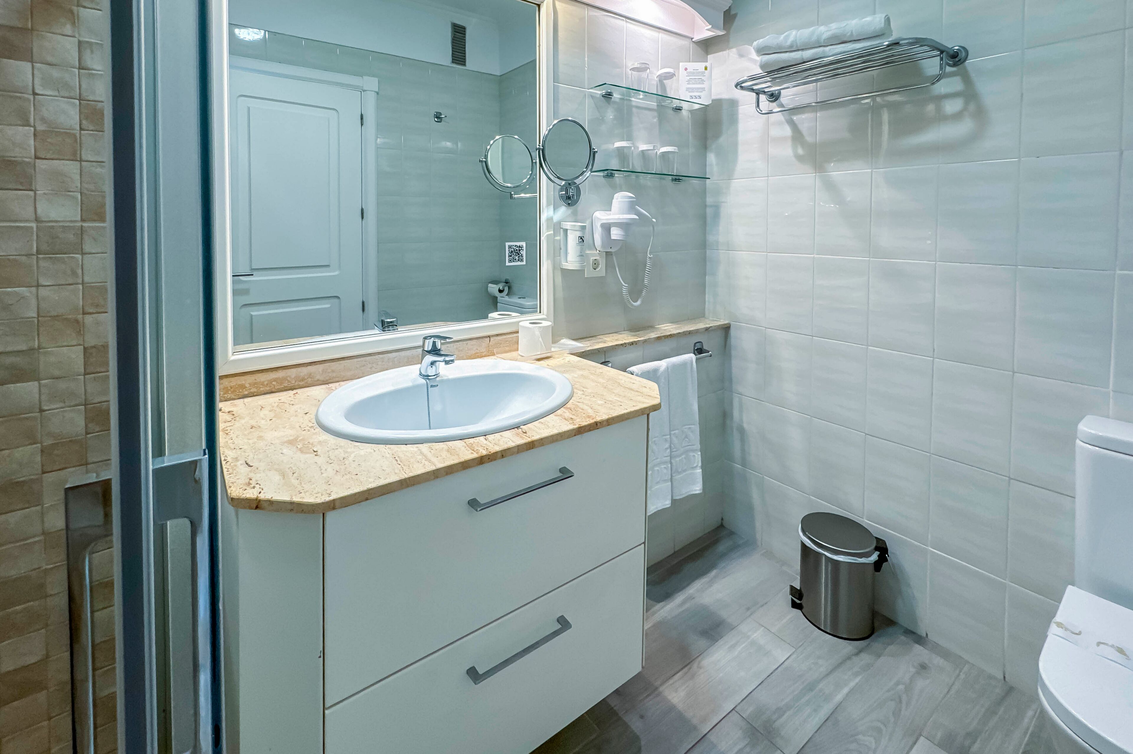 hair dryer, towels, soap, shampoo