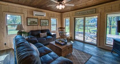 Picturesque perch next to the Mulberry River with instant access to Oark AR!