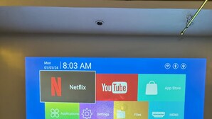 A projection of a smart TV interface with app icons for Netflix, YouTube, App Store, and other settings. - Cozy Familia Apartment Studio Type (Cagayan de Oro City)