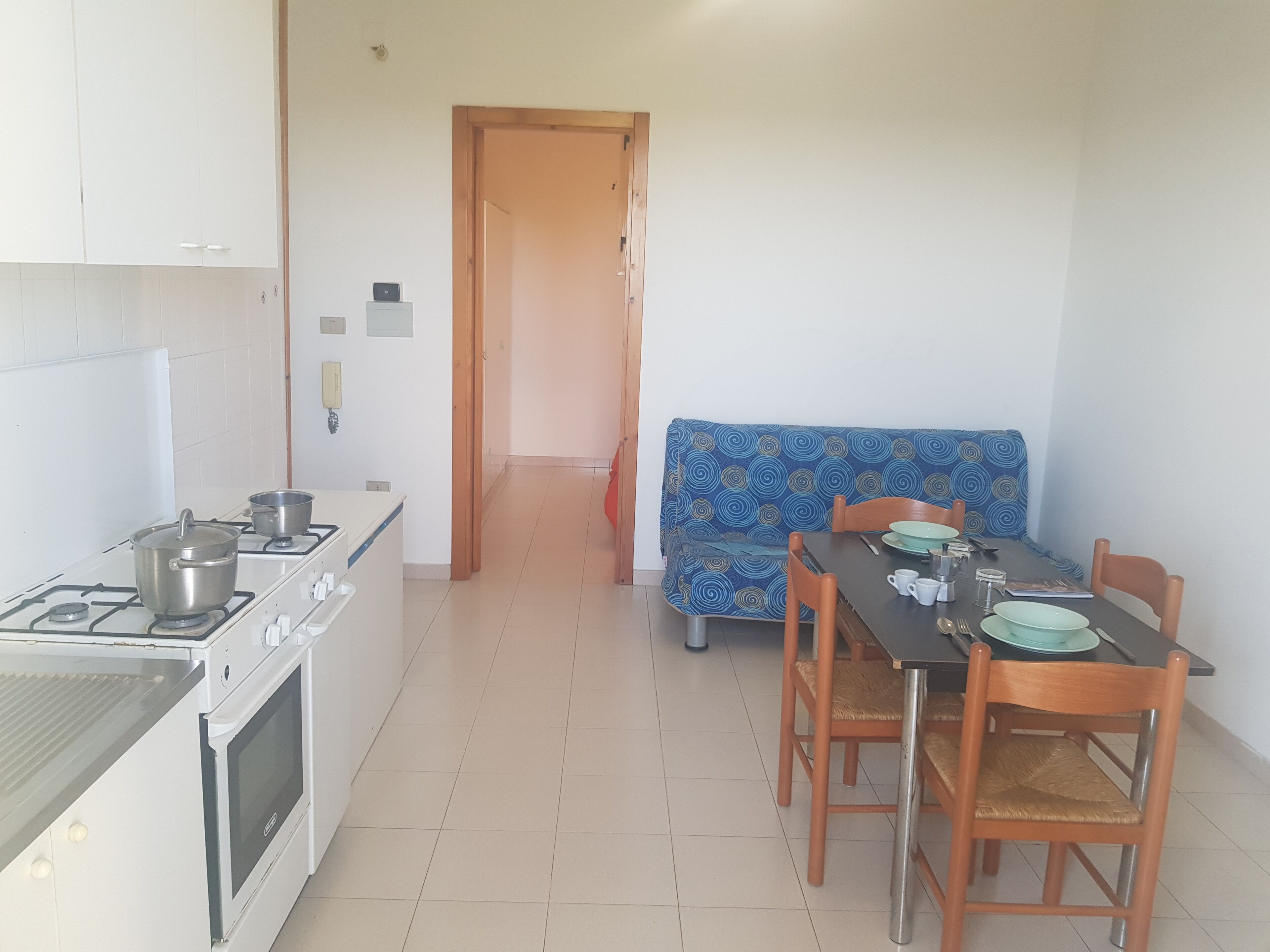 Apartment, 1 Bedroom (Bilocale Europa 90) | Living area | Flat-screen TV