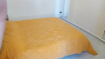 Apartment, 2 Bedrooms (Trilocali Baia Blu) | 2 bedrooms, bed sheets