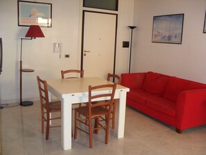 Apartment, 2 Bedrooms (Trilocali Baia Blu) | Living room | 32-inch flat-screen TV with digital channels, TV - Baia Blu (Gallipoli)