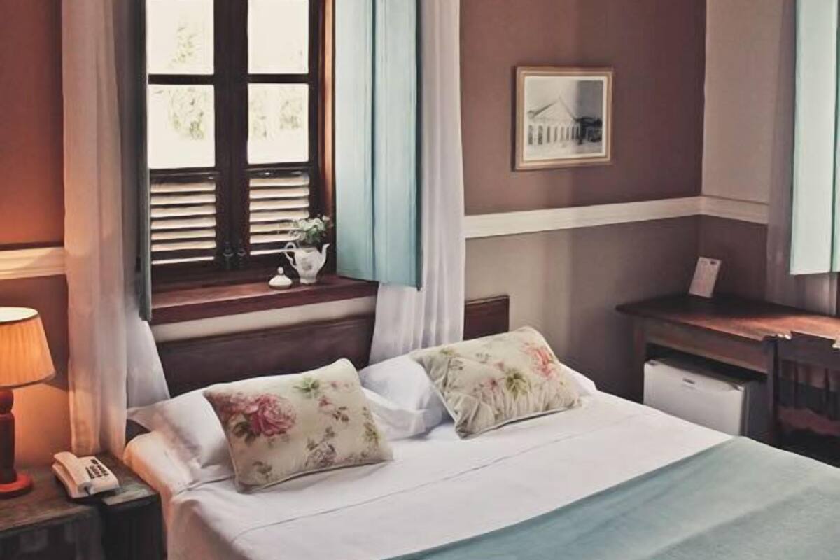 Superior Quadruple Room | Minibar, in-room safe, desk, blackout curtains