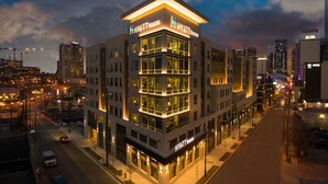 A multi-story hotel with a prominent 'Hyatt House' sign, large windows, and a modern architectural design. - Hyatt House Nashville Downtown/Convention Center (Nashville)