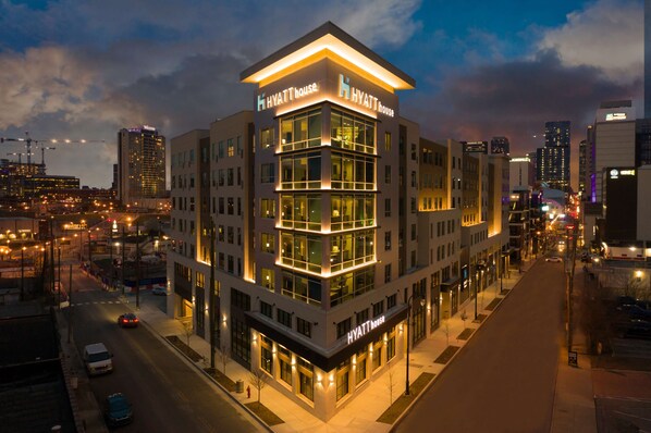 A multi-story hotel with a prominent 'Hyatt House' sign, large windows, and a modern architectural design. - Hyatt House Nashville Downtown/Convention Center (Nashville)