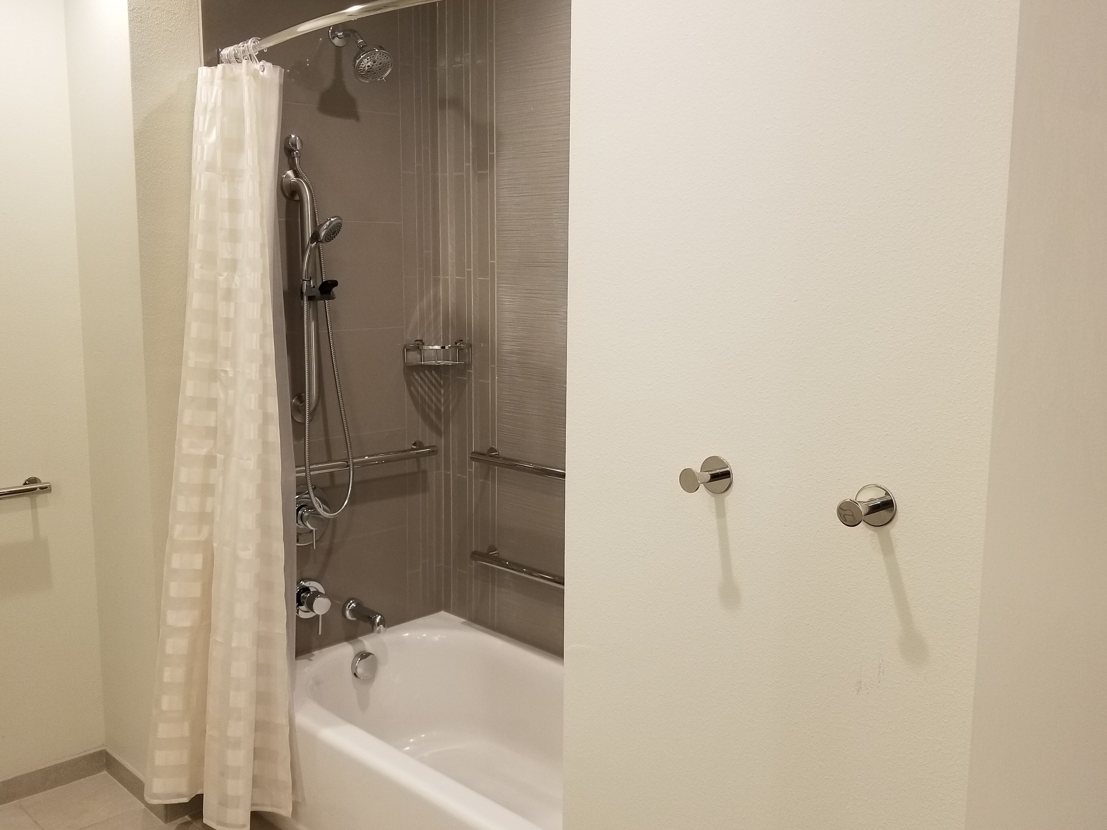 combined shower/bathtub, free toiletries, hair dryer, towels