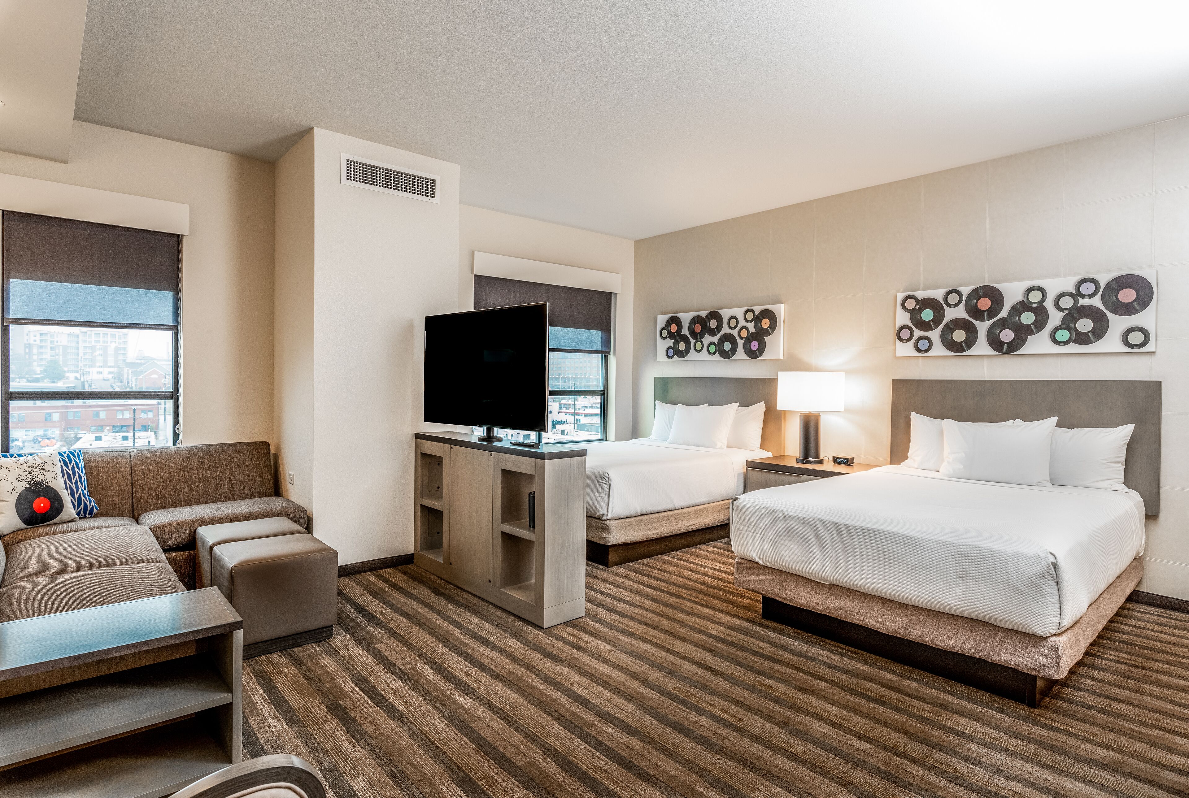 studio suite (2 queen beds and 1 sofa bed) | in-room safe, desk, iron/ironing board, free cots/infant beds