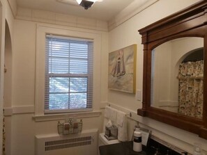 Combined shower/tub