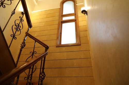 The villa has 3 bedrooms,3 bathrooms,a dining area, and a patio with garden view