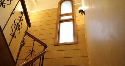 The villa has 3 bedrooms,3 bathrooms,a dining area, and a patio with garden view