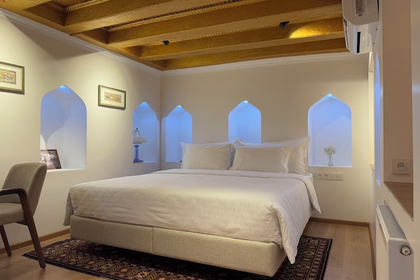 Egyptian cotton sheets, premium bedding, down duvets, memory-foam beds