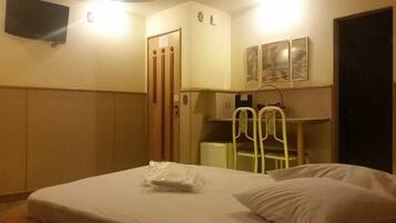 1 habitación, minibar y espacio para trabajar con laptop