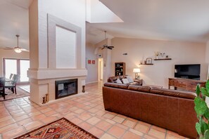 Smart TV, fireplace, books