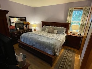 Quarto executivo | Roupas de cama premium, frigobar (abastecido com itens grátis)