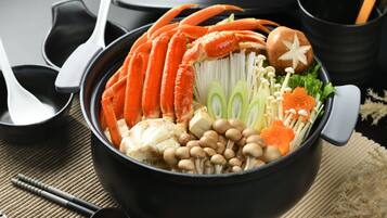 A bowl of food with various ingredients.
