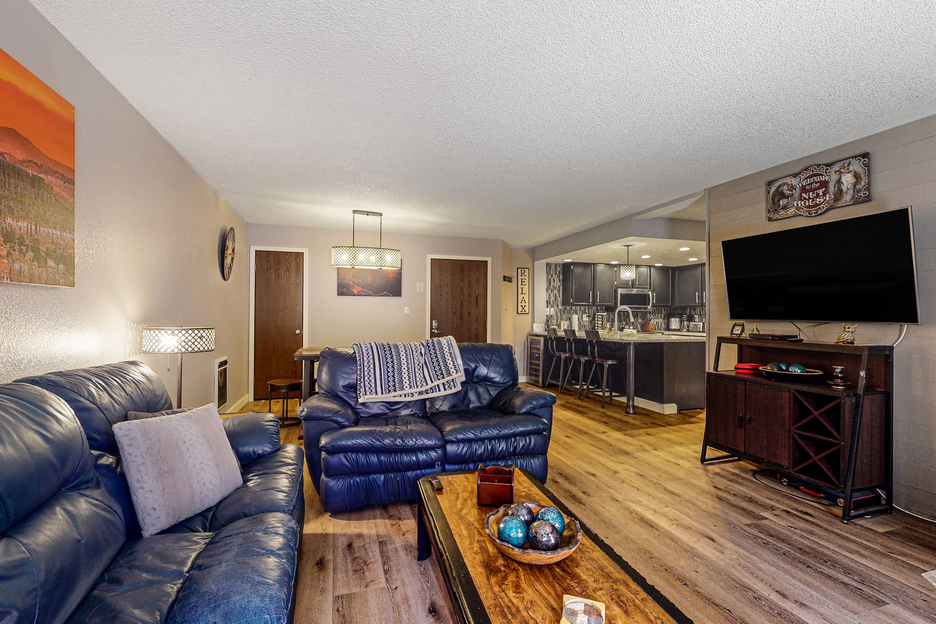 Ski-in/ski-out condo with furnished deck, firepit, & mountain views