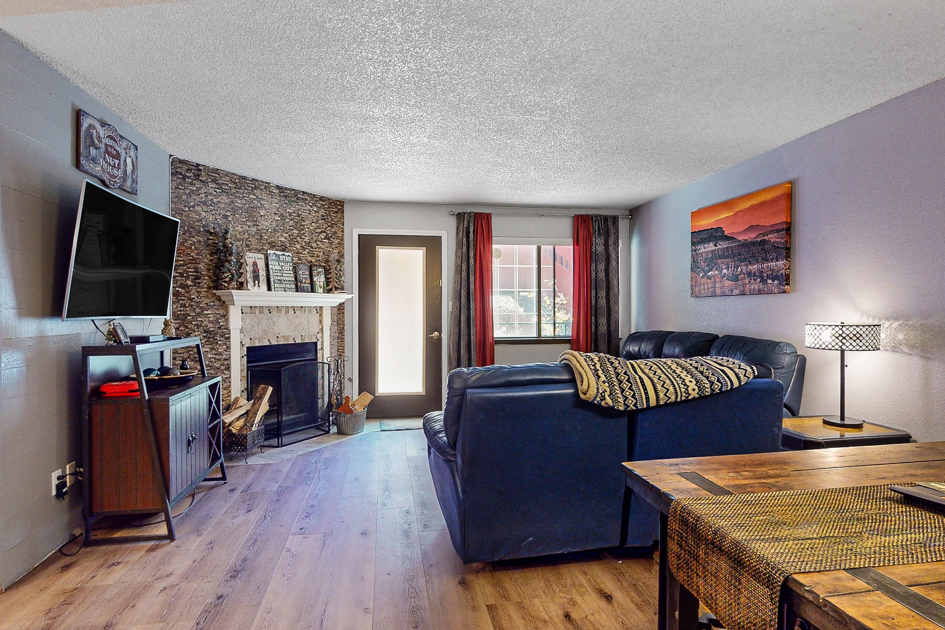 Ski-in/ski-out condo with furnished deck, firepit, & mountain views