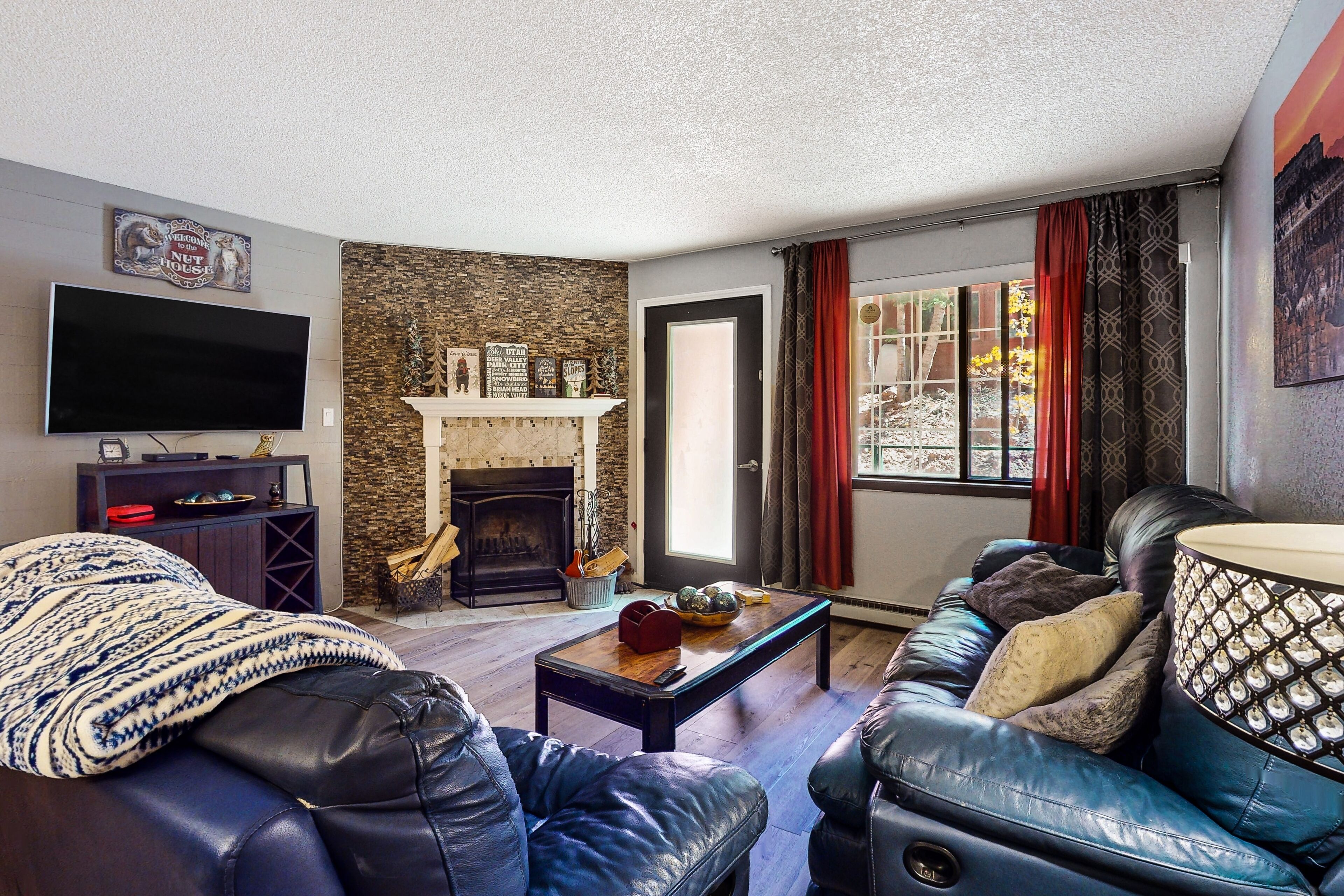 Ski-in/ski-out condo with furnished deck, firepit, & mountain views