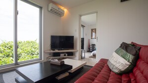 Private Vacation Home | Living room | Flat-screen TV - Sea Terrace Hanaasagi (Ishigaki)
