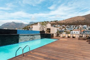 Outdoor pool, pool umbrellas, pool loungers - Unit Number 620 Cape Royale Luxury Apartments (Cape Town)