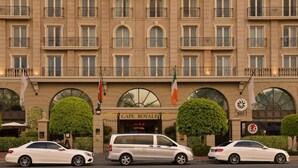 A multi-story hotel with a classic architectural style, featuring arched windows and balconies. - Unit Number 620 Cape Royale Luxury Apartments (Cape Town)