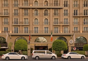 A multi-story hotel with a classic architectural style, featuring arched windows and balconies. - Unit Number 620 Cape Royale Luxury Apartments (Cape Town)