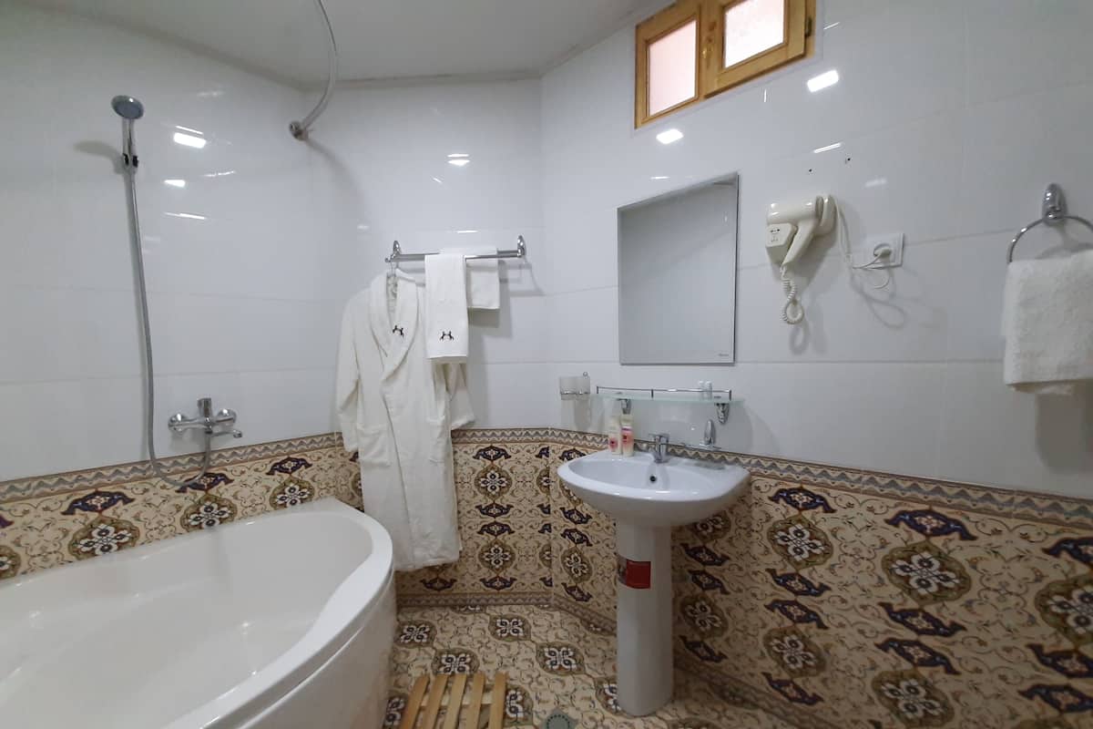 Slippers, towels, soap, toilet paper