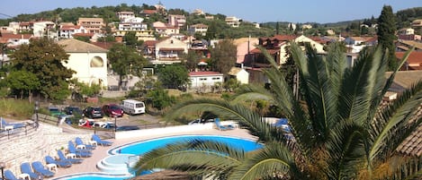 Seasonal outdoor pool, pool umbrellas