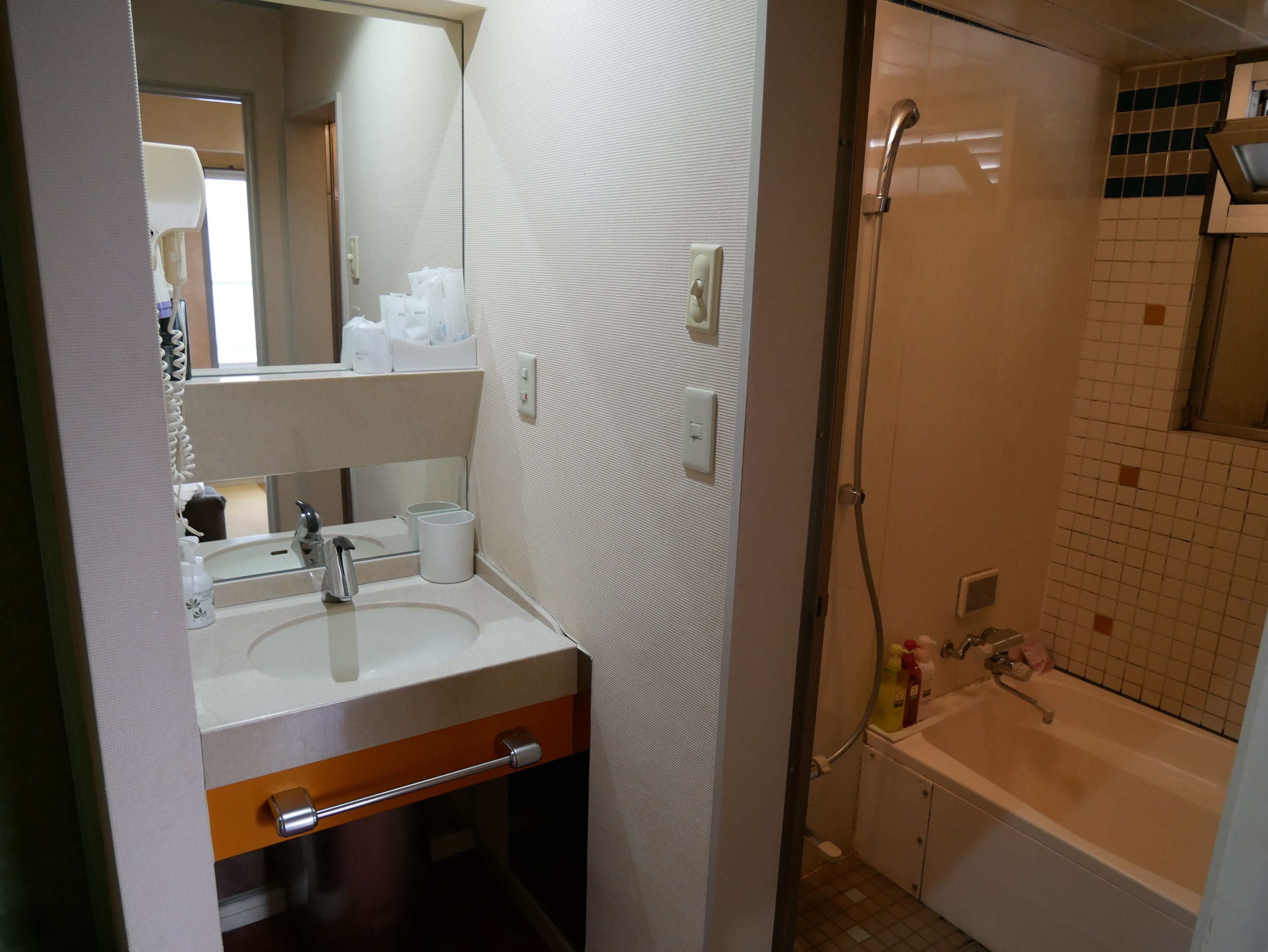 Separate bathtub and shower, free toiletries, bathrobes, slippers