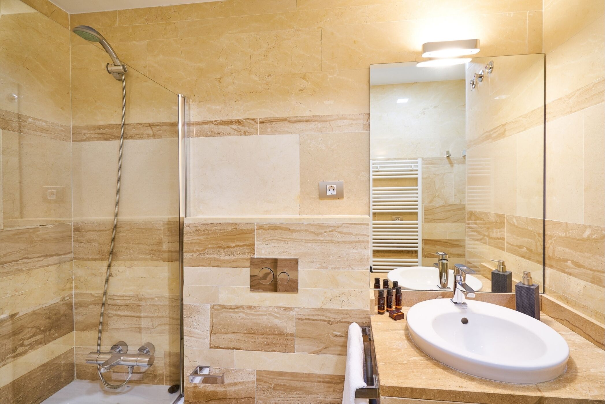 Bathtub, hair dryer, towels