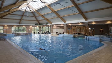 Indoor pool, open 7:00 AM to 10:00 PM, pool loungers