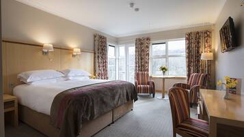 Hypo-allergenic bedding, down duvets, in-room safe