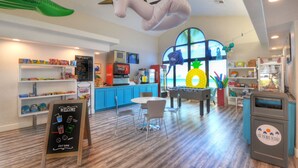 A brightly lit indoor space with a self-serve counter, seating area, and various amenities. - Las Palmas Resort 704, Newly Renovated Main level 3 bd unit, Close to pool + More (St. George)
