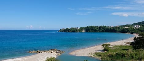 On the beach, sun-loungers, beach towels