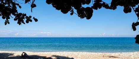 On the beach, sun loungers