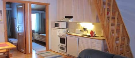 Apartment, 2 Bedrooms | Private kitchen | Full-sized fridge, microwave, oven, stovetop