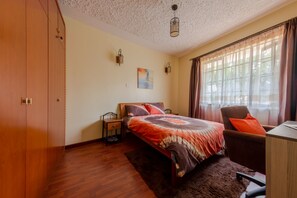 Standard Double Room | Desk, laptop workspace, blackout drapes, iron/ironing board - Zanna Guests (Nairobi)